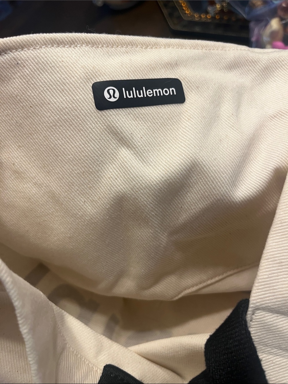 Please read Lululemon athletica Cream Canvas Tote with Black Logo and Straps - Picture 8 of 10